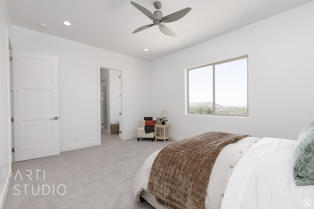 carpeted bedroom with ceiling fan