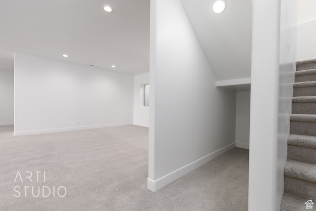 stairway with carpet floors