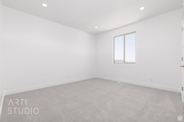 445 N 250 E, La Verkin, UT 84745 - spare room featuring light carpet, baseboards, and recessed lighting