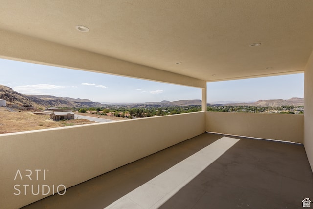 balcony featuring a mountain view