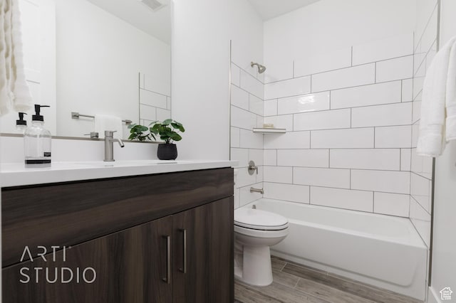 445 N 250 E, La Verkin, UT 84745 - full bathroom featuring vanity, wood finished floors, tub / shower combination, and toilet
