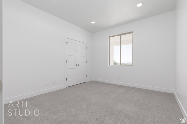 445 N 250 E, La Verkin, UT 84745 - unfurnished bedroom with light colored carpet, baseboards, and recessed lighting