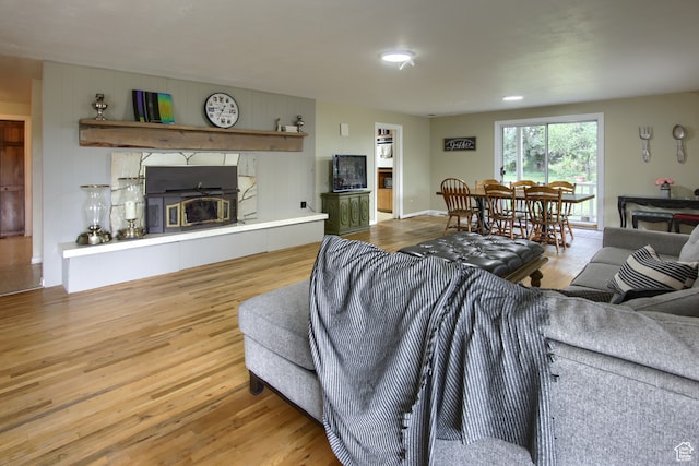 living room with light hardwood / wood-style flooring