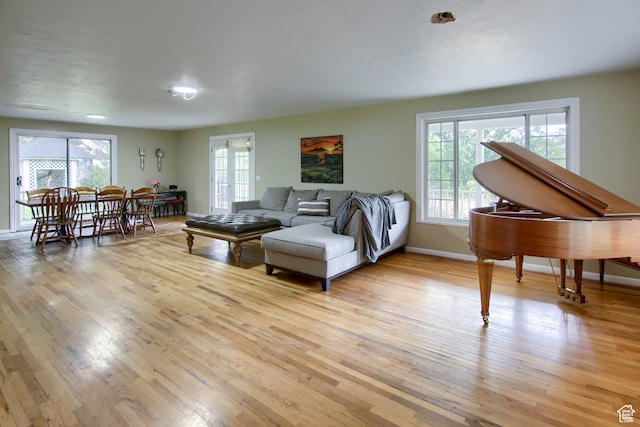 living room with light hardwood / wood-style floors