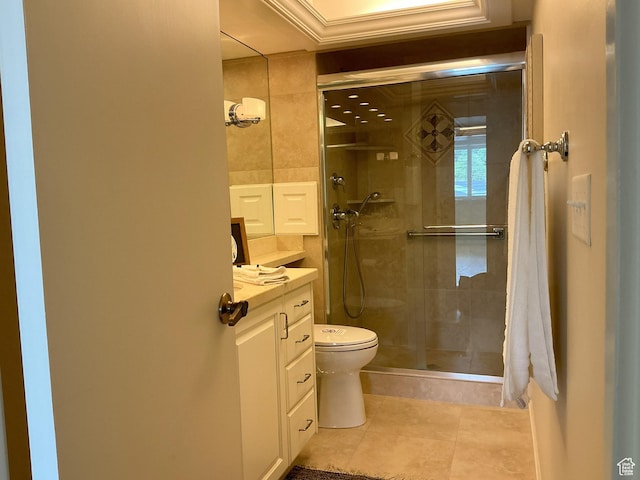 full bath with toilet, a shower stall, tile patterned flooring, and vanity
