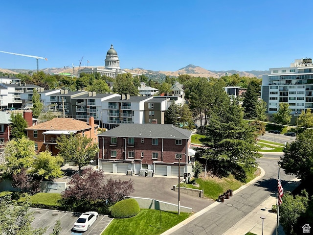 bird's eye view with a residential view and a mountain view