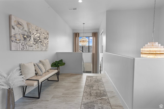 2596 S Gritton St, Hurricane, UT 84737 - hall with a notable chandelier, baseboards, and visible vents