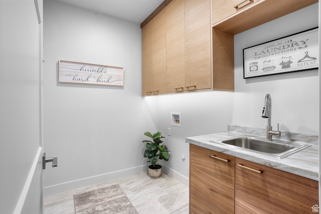 2596 S Gritton St, Hurricane, UT 84737 - washroom with hookup for a washing machine, cabinet space, baseboards, and a sink