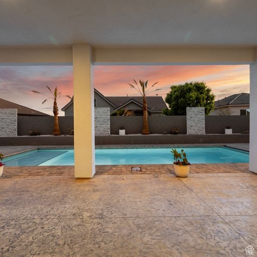 2596 S Gritton St, Hurricane, UT 84737 - view of swimming pool with a fenced in pool, a patio, and fence