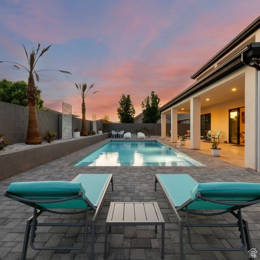 2596 S Gritton St, Hurricane, UT 84737 - view of swimming pool featuring a patio, a fenced backyard, and a fenced in pool