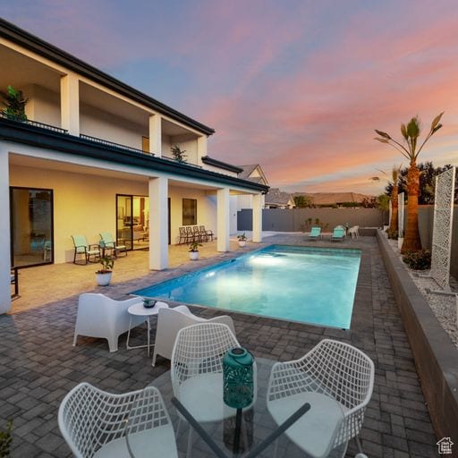 2596 S Gritton St, Hurricane, UT 84737 - view of swimming pool with a patio area, a fenced in pool, and a fenced backyard