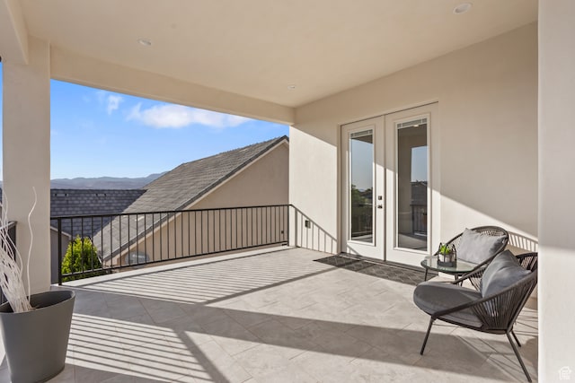 2596 S Gritton St, Hurricane, UT 84737 - view of patio with a balcony, french doors, and a mountain view