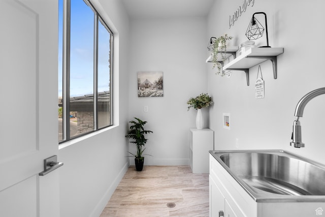 2596 S Gritton St, Hurricane, UT 84737 - bathroom with a sink and baseboards