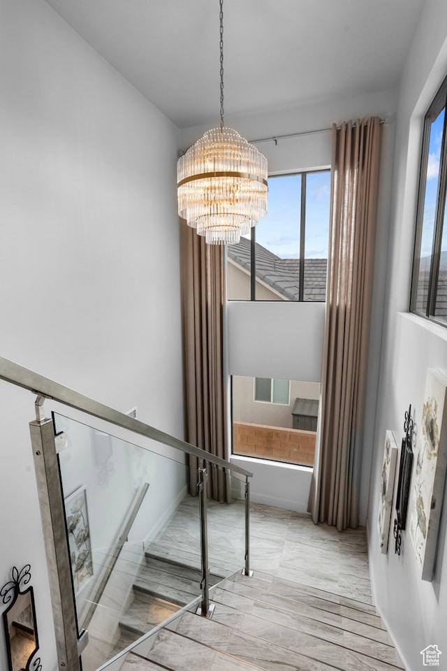 2596 S Gritton St, Hurricane, UT 84737 - staircase featuring a chandelier