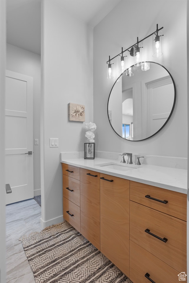 2596 S Gritton St, Hurricane, UT 84737 - bathroom with baseboards and vanity