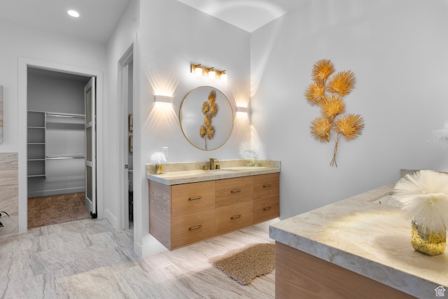 2596 S Gritton St, Hurricane, UT 84737 - full bathroom with recessed lighting, a walk in closet, and vanity