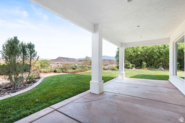 view of patio featuring a mountain view