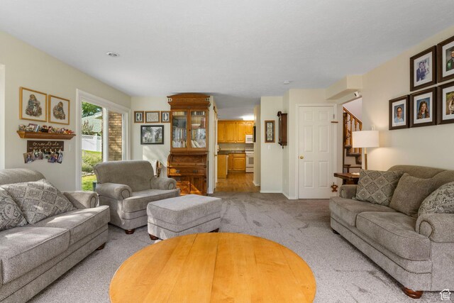 546 E River Meadow Dr S, Alpine, UT 84004 - living room featuring stairway and carpet flooring