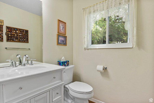 546 E River Meadow Dr S, Alpine, UT 84004 - half bathroom with vanity, baseboards, and toilet