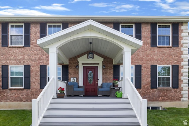 546 E River Meadow Dr S, Alpine, UT 84004 - doorway to property featuring a porch and brick siding