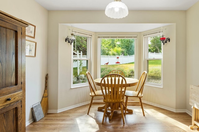 546 E River Meadow Dr S, Alpine, UT 84004 - dining area with light wood-style flooring and baseboards