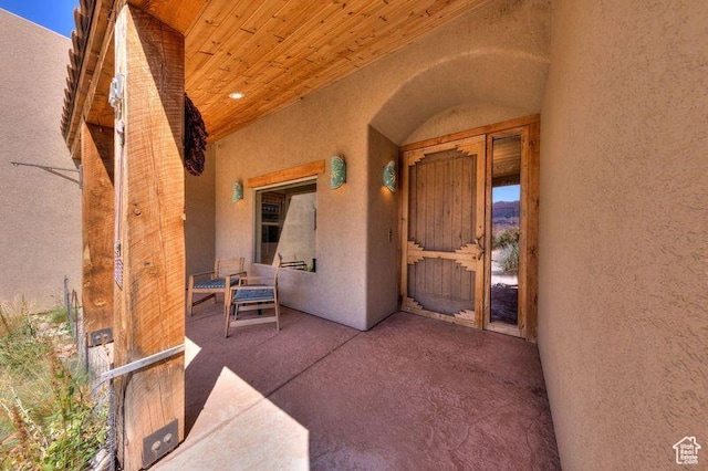 431 E Coronado Ln, Moab, UT 84532 - doorway to property featuring a patio and stucco siding