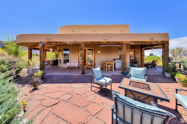 431 E Coronado Ln, Moab, UT 84532 - view of patio / terrace with a fire pit