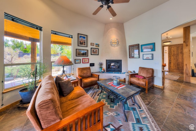 431 E Coronado Ln, Moab, UT 84532 - living room with stone tile floors, recessed lighting, baseboards, and ceiling fan