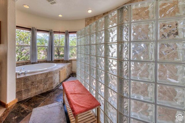 431 E Coronado Ln, Moab, UT 84532 - full bathroom with recessed lighting, visible vents, a garden tub, and stone tile flooring