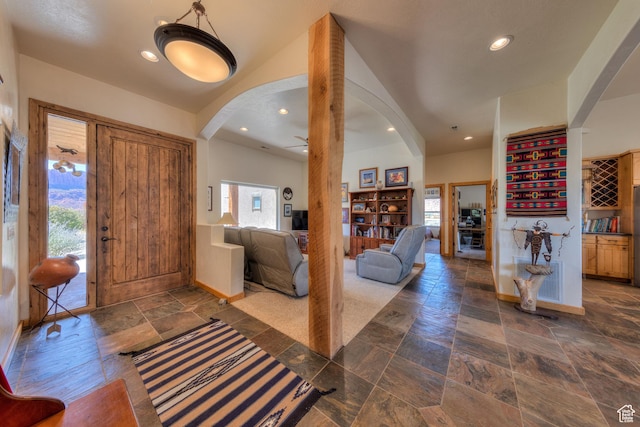 431 E Coronado Ln, Moab, UT 84532 - entrance foyer with recessed lighting, baseboards, arched walkways, and stone tile floors
