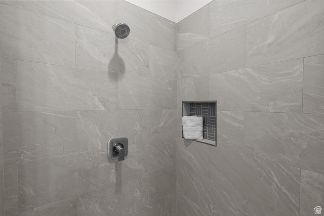 details featuring a tile shower