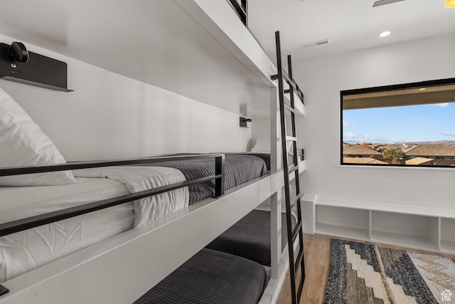 bedroom featuring wood-type flooring