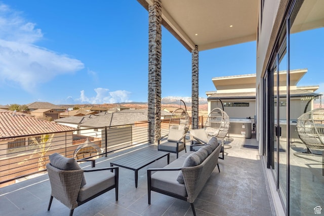 view of patio / terrace with a balcony