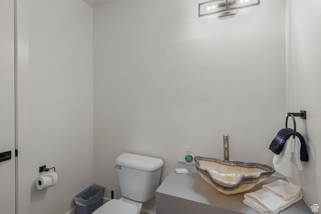 bathroom featuring toilet