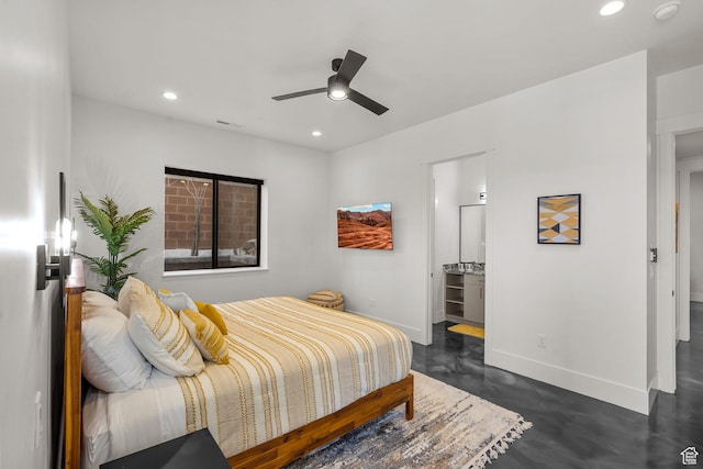 bedroom with ceiling fan and connected bathroom