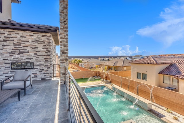 view of pool featuring pool water feature