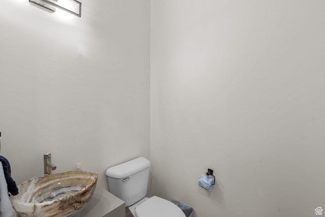bathroom with sink and toilet