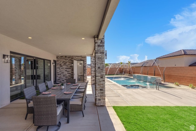 view of swimming pool featuring a patio