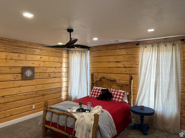 109 Gentle Ben Rd, Fish Haven, ID 83287 - bedroom with wooden walls, carpet floors, recessed lighting, and ceiling fan