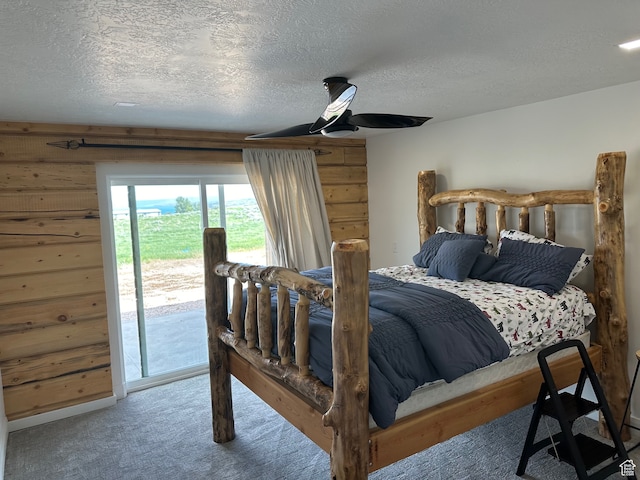 109 Gentle Ben Rd, Fish Haven, ID 83287 - bedroom featuring a ceiling fan, access to outside, carpet flooring, and a textured ceiling
