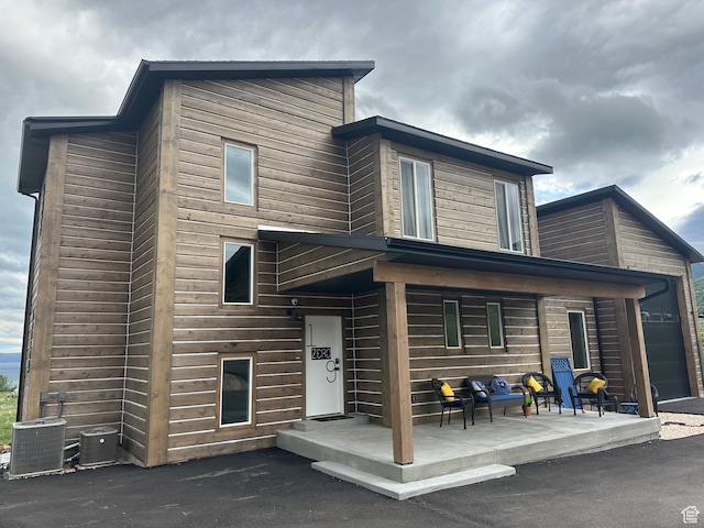 109 Gentle Ben Rd, Fish Haven, ID 83287 - modern home featuring cooling unit and a porch