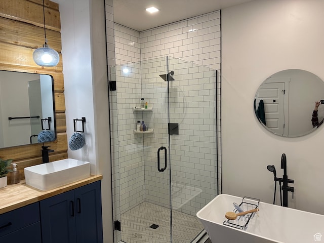 109 Gentle Ben Rd, Fish Haven, ID 83287 - bathroom with a freestanding bath, a shower stall, and vanity