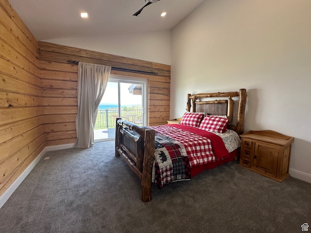 109 Gentle Ben Rd, Fish Haven, ID 83287 - carpeted bedroom with vaulted ceiling, baseboards, wood walls, access to exterior, and recessed lighting