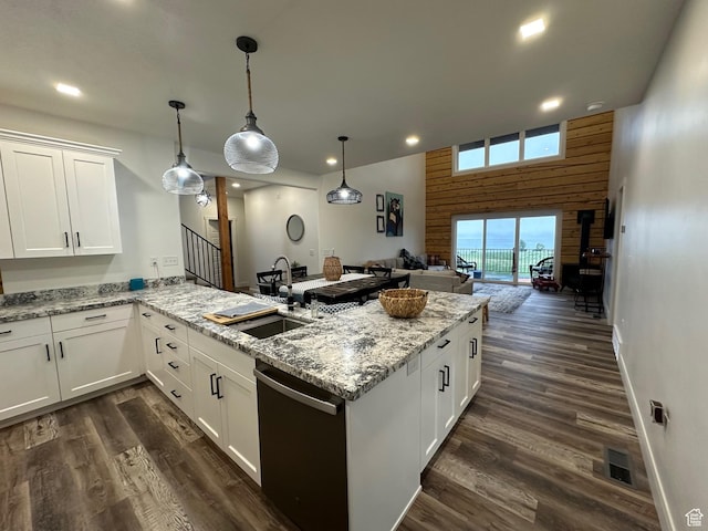 109 Gentle Ben Rd, Fish Haven, ID 83287 - kitchen with a sink, open floor plan, dishwasher, a peninsula, and recessed lighting