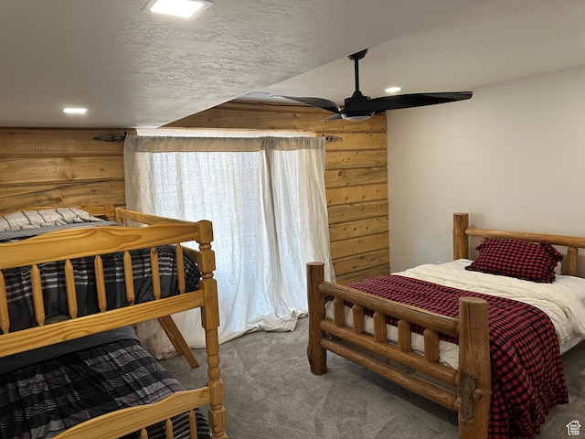 109 Gentle Ben Rd, Fish Haven, ID 83287 - bedroom featuring carpet floors, wood walls, and ceiling fan