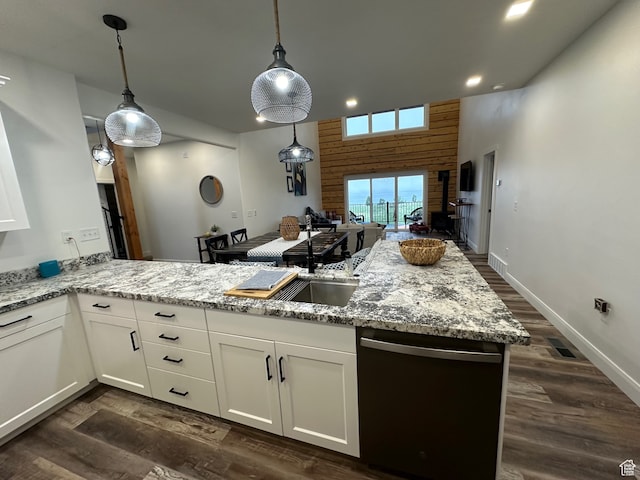 109 Gentle Ben Rd, Fish Haven, ID 83287 - kitchen featuring light stone counters, dishwasher, white cabinets, a peninsula, and recessed lighting