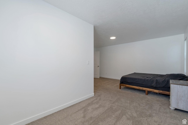 621 Plum Creek Ln, Ogden, UT 84404 - bedroom with recessed lighting, a textured ceiling, baseboards, and carpet
