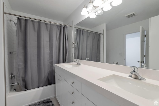 621 Plum Creek Ln, Ogden, UT 84404 - bathroom with double vanity, visible vents, shower / tub combo with curtain, and a sink