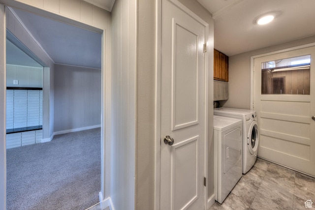 414 W Park Dr W Unit 14, Moab, UT 84532 - laundry area with cabinet space, separate washer and dryer, and light carpet