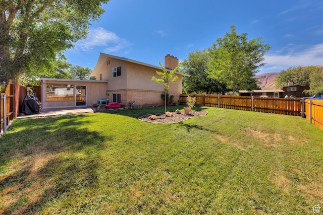 414 W Park Dr W Unit 14, Moab, UT 84532 - view of yard with a fenced backyard